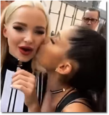 Ariana kisses Dove on the cheek (12 Dec 2016)
